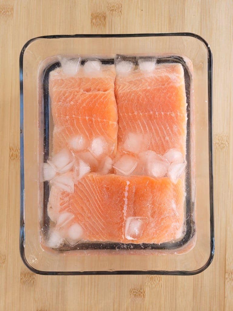 How can you defrost salmon quickly?