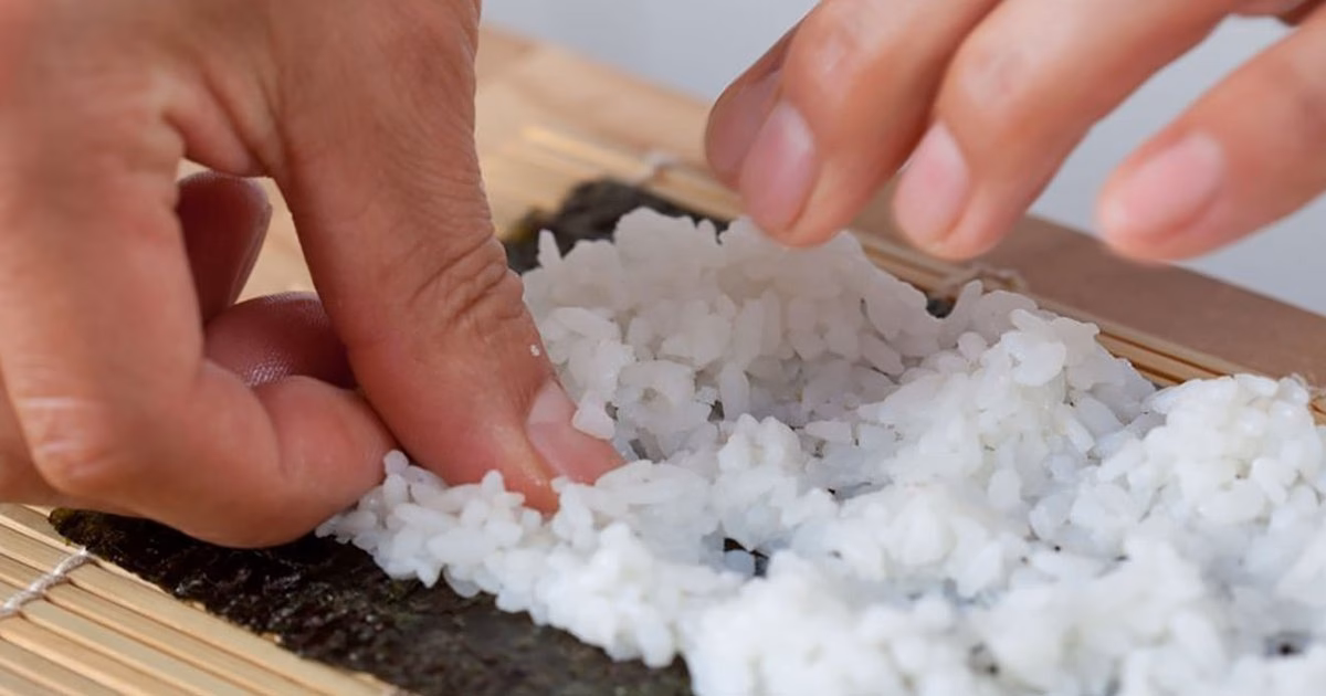 Do you season rice before or after cooking sushi?